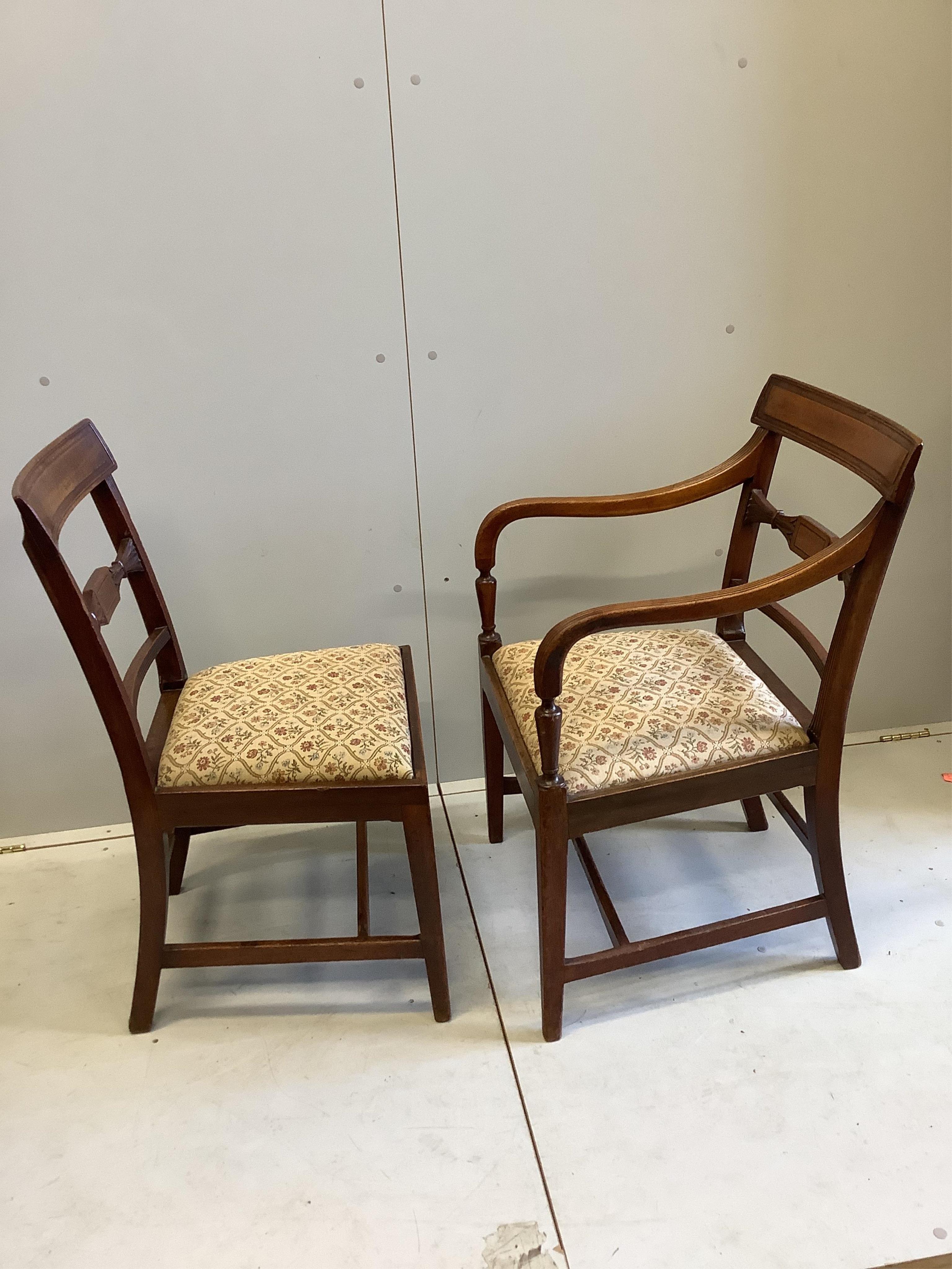 A set of six George III provincial mahogany dining chairs, two with arms, height 88cm. Condition - fair